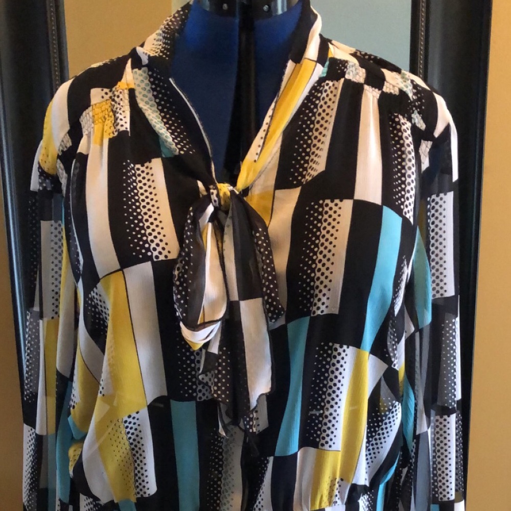 Sheer multi print blouse.